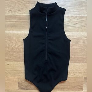 Garage quarter-zip mock neck bodysuit